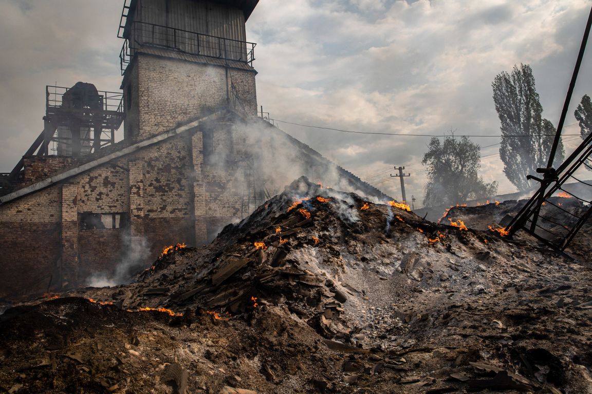 The ashes of burnt grain can be seen in a grain silo in the town of Sivers’k, Donbas