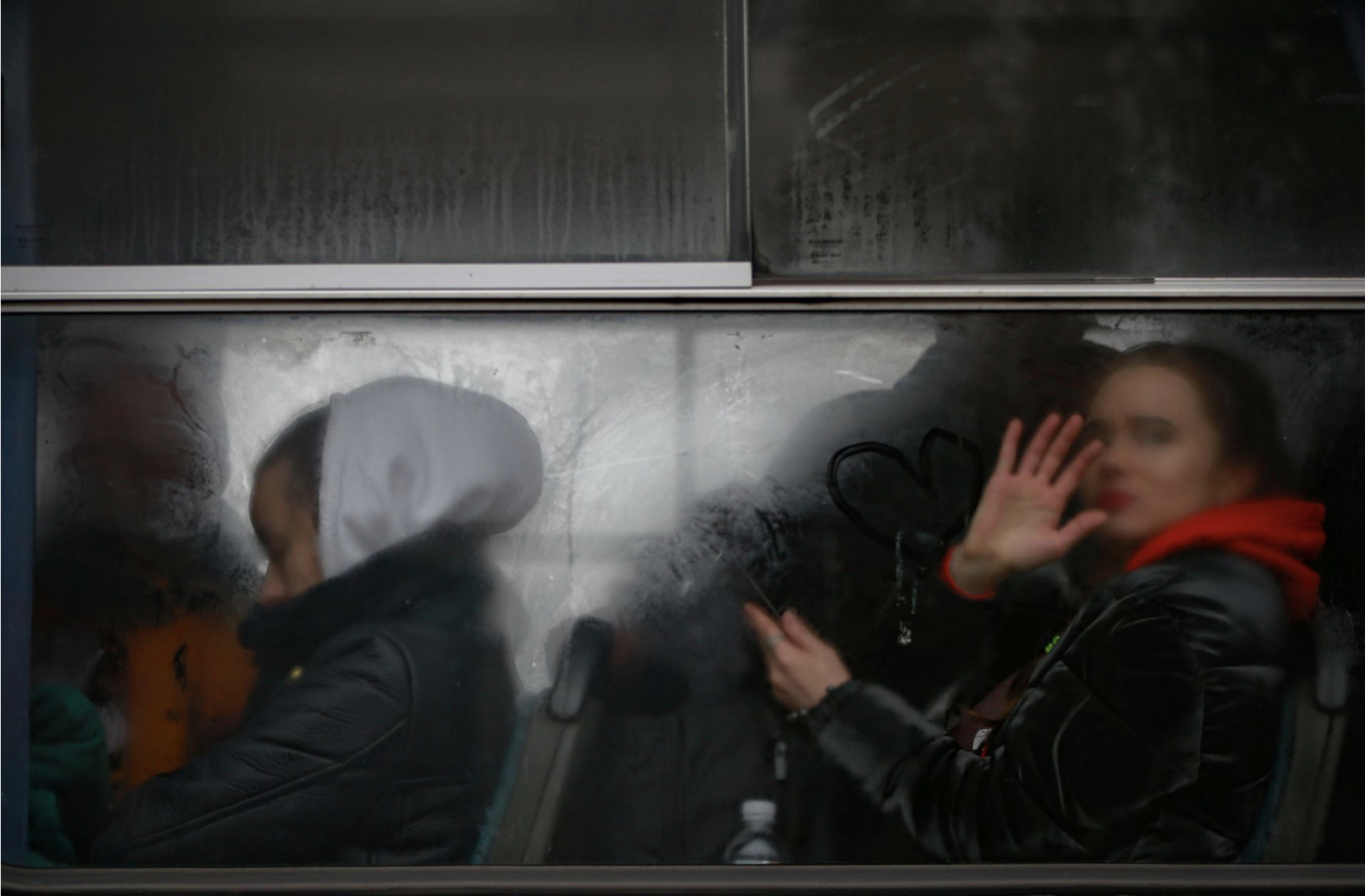 українська біженка в автобусі